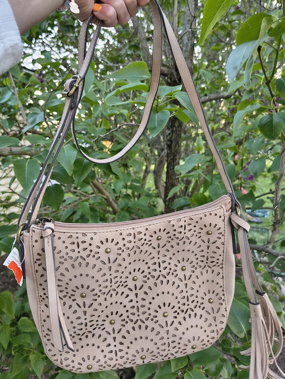 Bueno Beige Perforated Crossbody Bag Floral And Stud Accents with Tassel